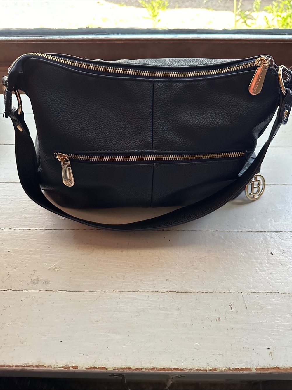 Navy Shoulder Bag with Gold Hardware and Branded Charm